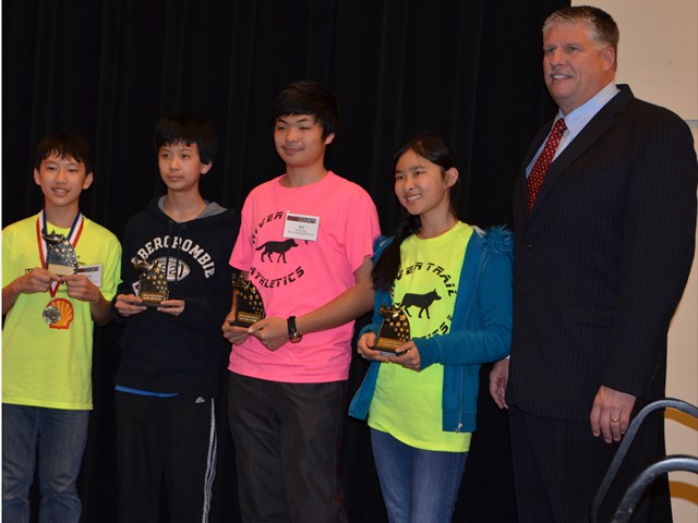 1st Place Team Winners: Kevin Xiang (Left), George Hu (2nd Left), Bill Zhang (Middle)